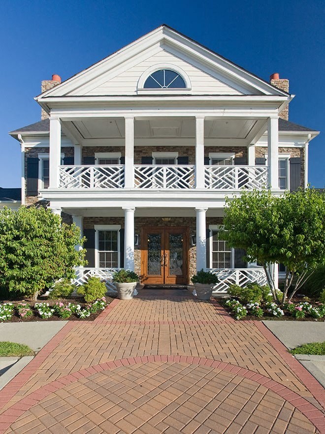 a large house with a brick walkway in front of it  at Harper's Crossing, Langhorne, 19047