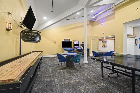 A room with a pool table and a sign that says "Champion".