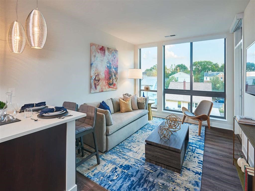 a living room with a couch and a table