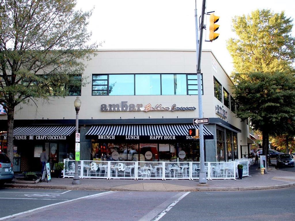a restaurant on the corner of a street