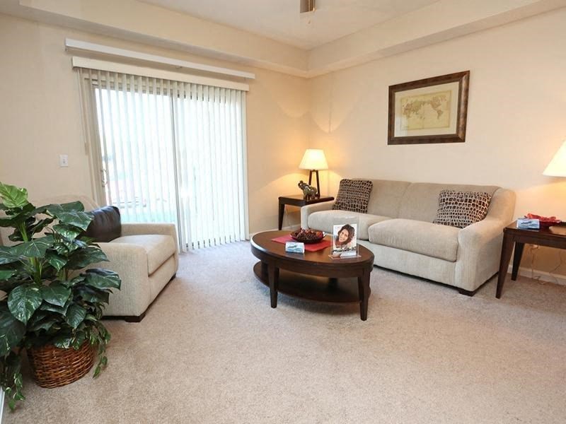 a living room with a couch and a table