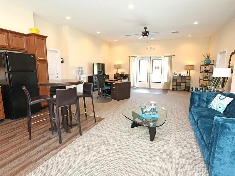 a living room with a couch and a table