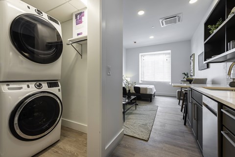 A laundry room with a washer and dryer.