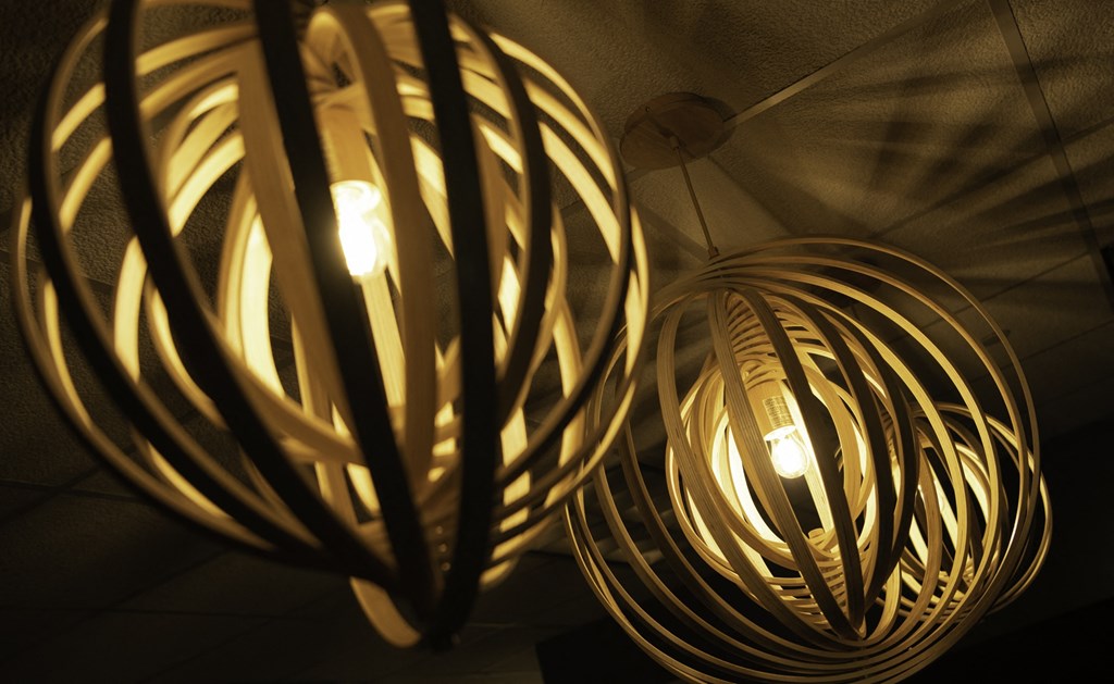 a couple of light fixtures hanging from the ceiling