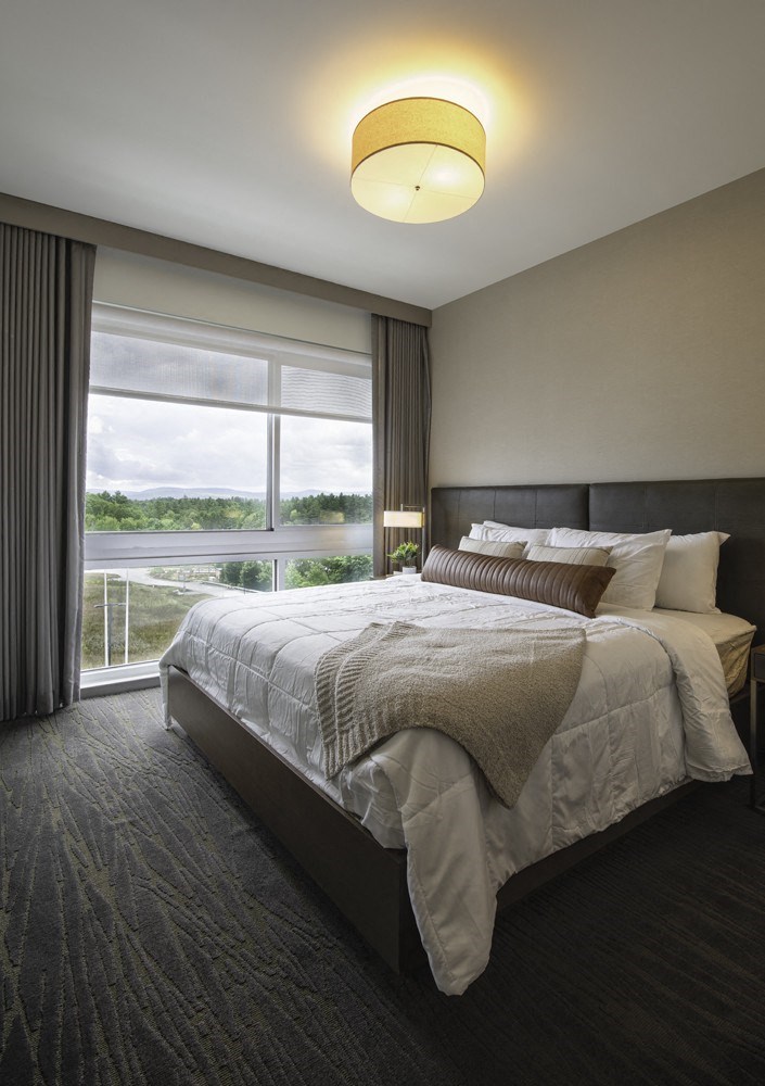 king size bed views comfort throw pillows big windows