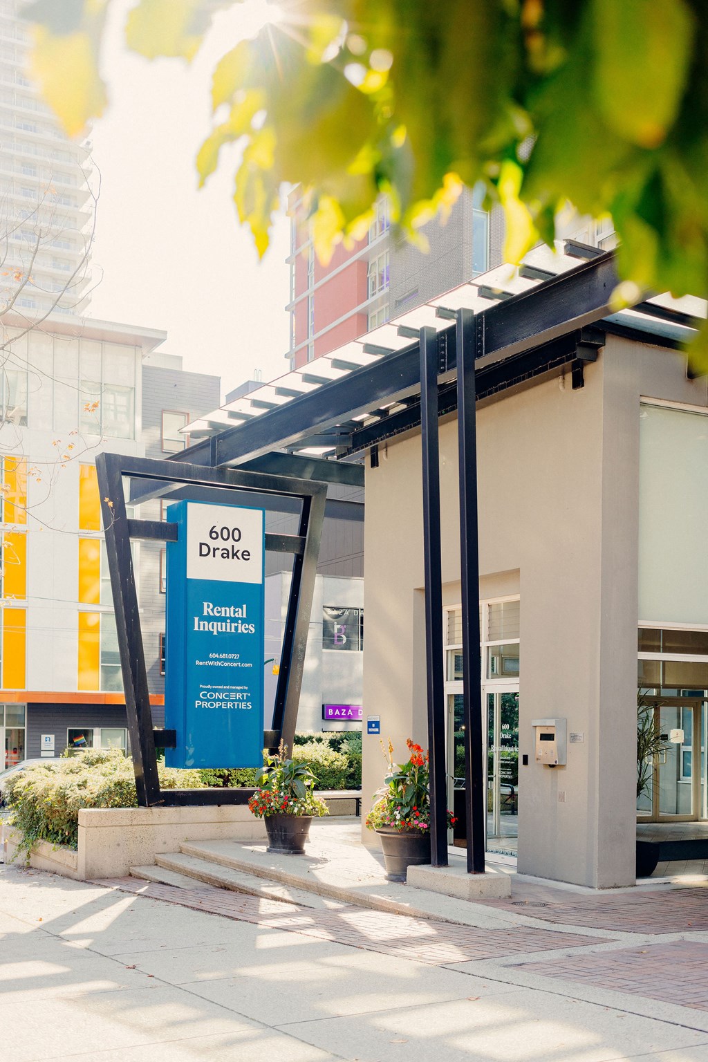 the facade of a building with a blue sign that reads 2020 direct