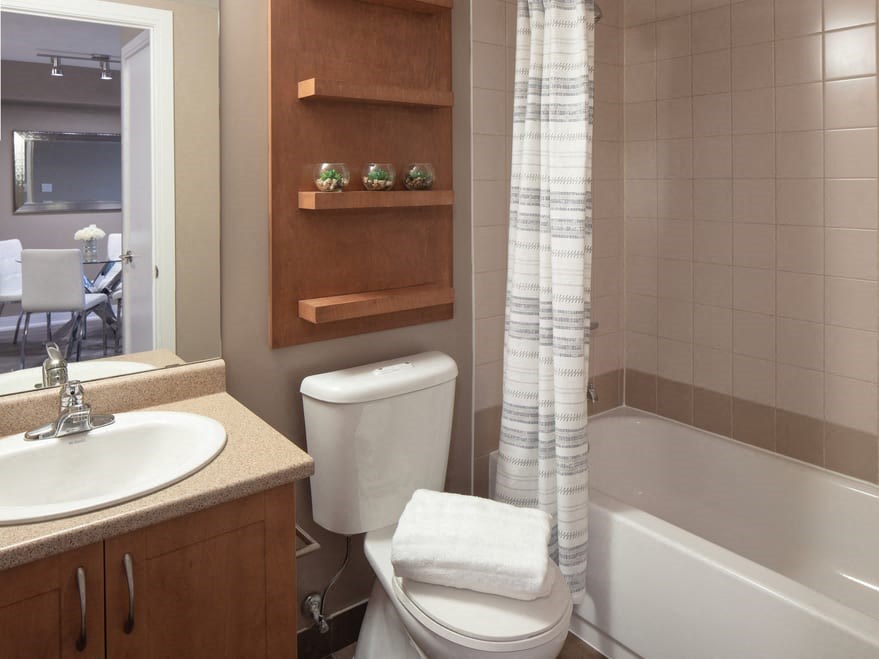 a bathroom with a toilet sink and bathtub