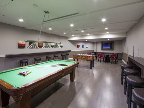 we have a large games room with a pool table and a foosball table
