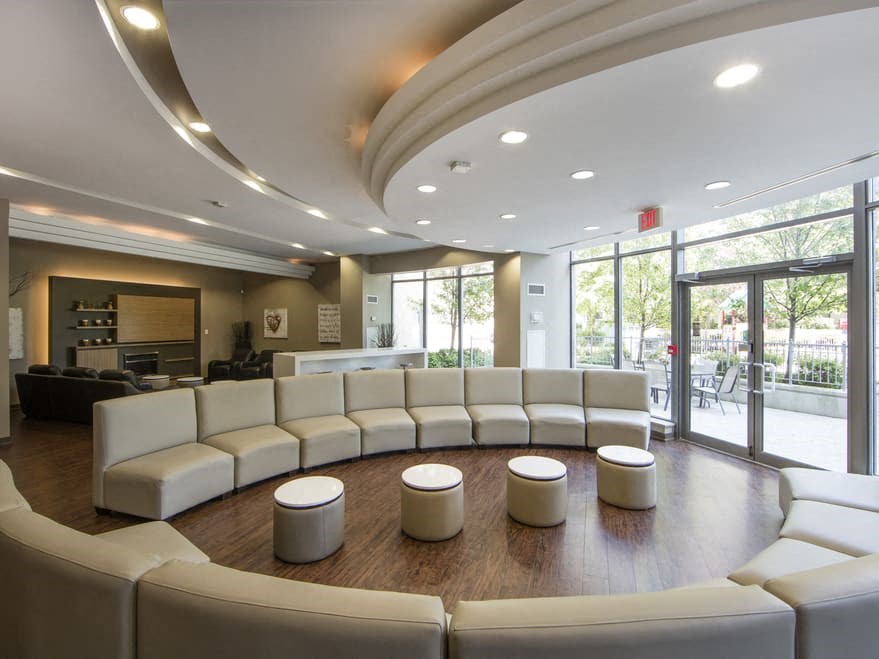 a large room with a couch and chairs