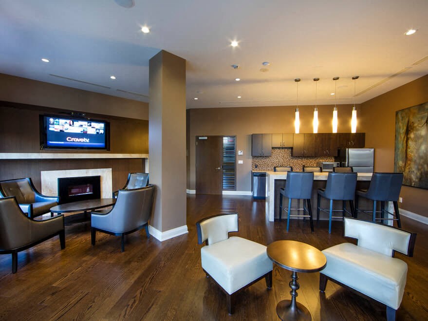 a living room filled with furniture and a fire place