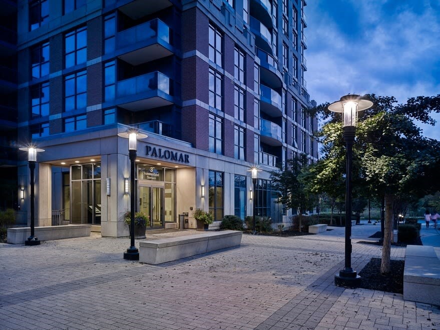 a building with a sign that reads palomar on the front of it