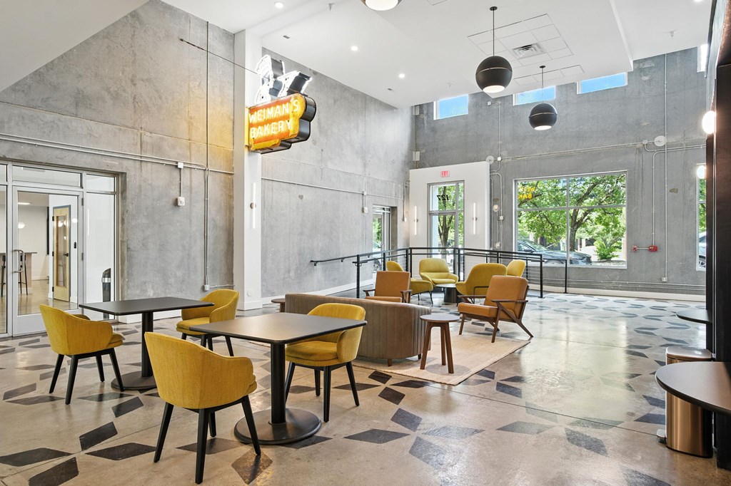 A room with a concrete wall and a Weigman's Bakery sign.