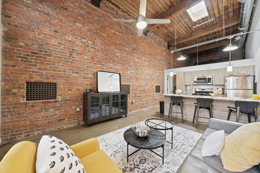 a living room with a couch and a table
