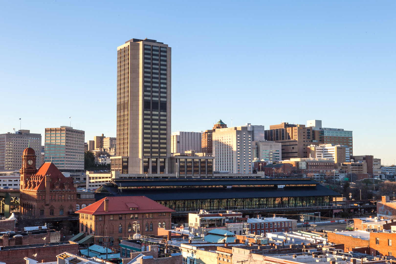 the skyline of the city with a tall skyscraper