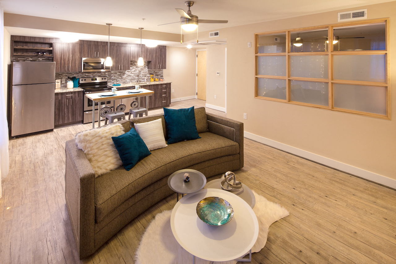 a living room with a couch and a table