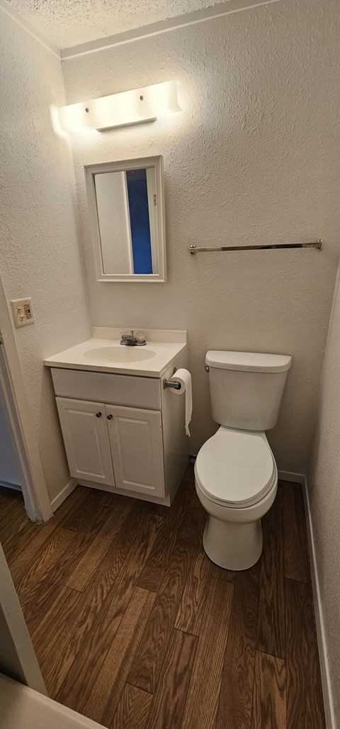 a small bathroom with a toilet and a sink