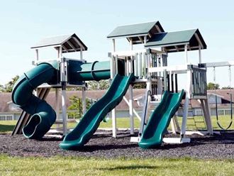 a playground with two sets of slides