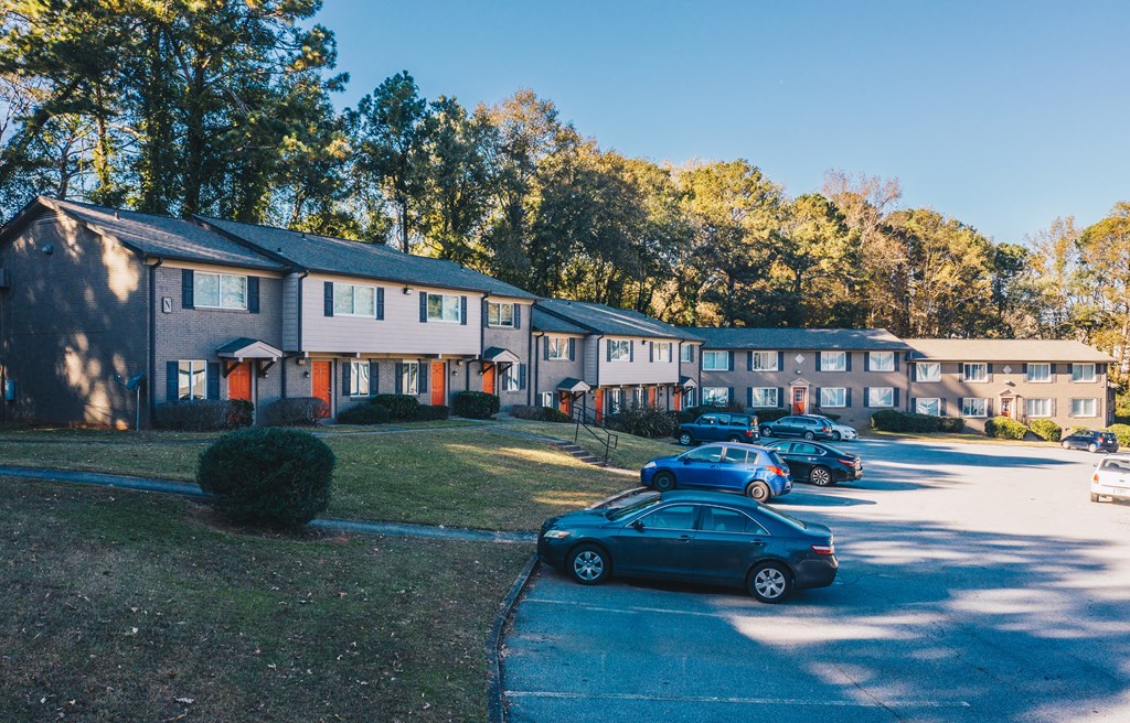 a row of houses with cars parked in front of them at Broadway at East Atlanta, Atlanta, 30316