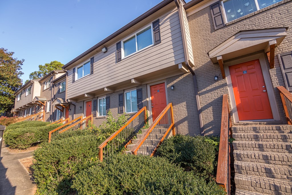 a row of houses with red doors at Broadway at East Atlanta, Atlanta, GA, 30316