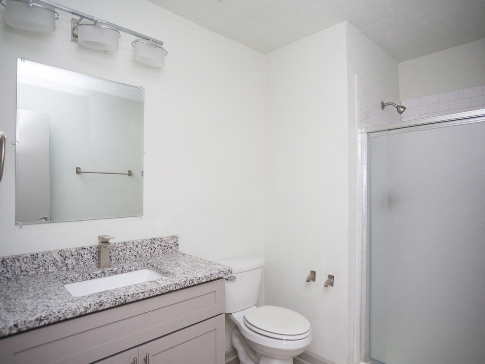 Bathroom with toilet at Gardens at Camp Creek, Georgia
