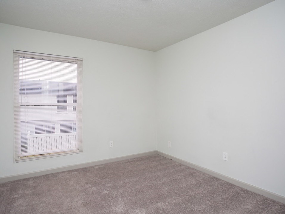 Bedroom with window at Gardens at Camp Creek, Atlanta, GA