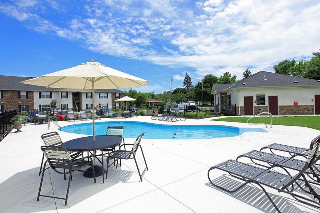 our apartments have a large pool and outdoor furniture