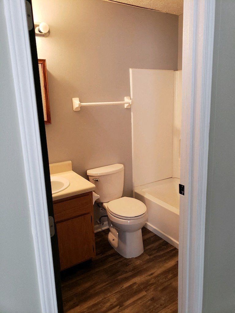 a small bathroom with a toilet and a sink