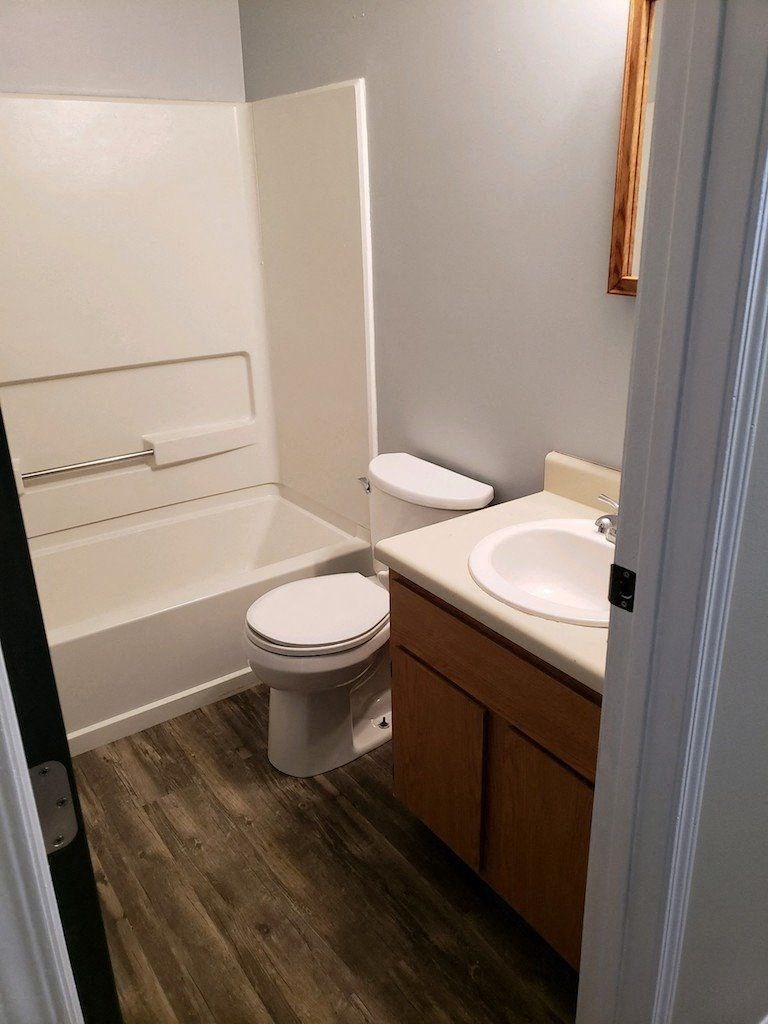 a bathroom with a toilet and a sink