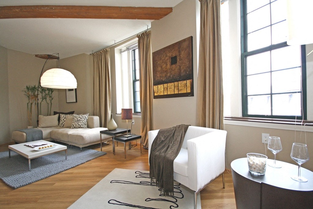 a living room with a couch and a table