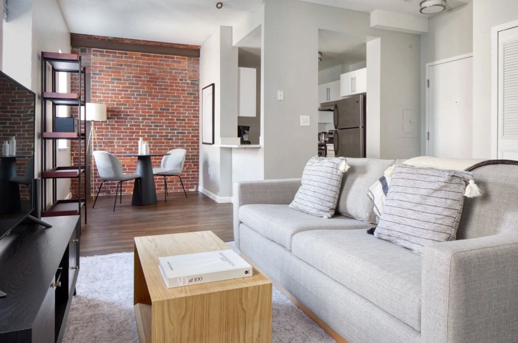 a living room with a couch and a coffee table