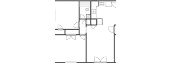 A black and white floor plan of a house with a kitchen, living room, and bathrooms.
