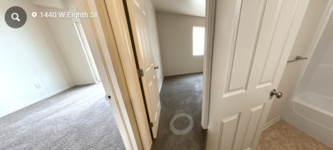 hallway view into bedrooms and bathroom