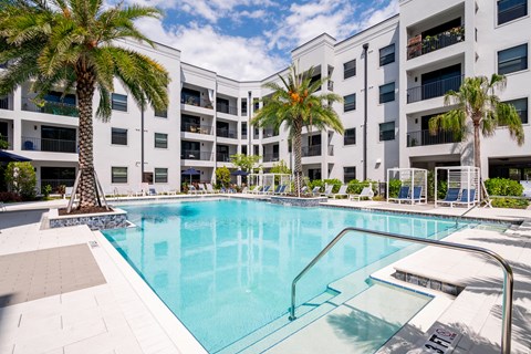 Community resort style pool with seating
