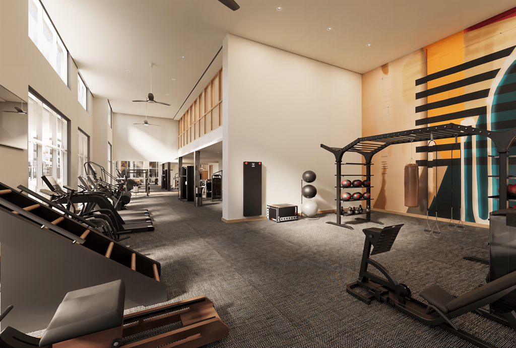 a gym with cardio machines and other exercise equipment in a large room
