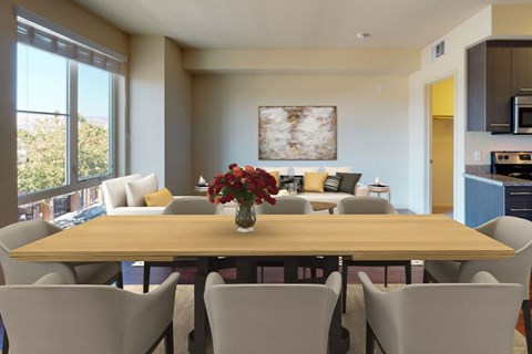 A dining room with a wooden table and chairs.