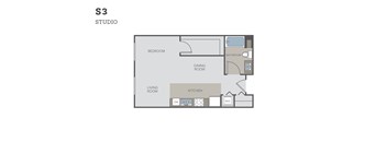 A floor plan of a studio apartment with a living room, kitchen, dining room, and bedroom.