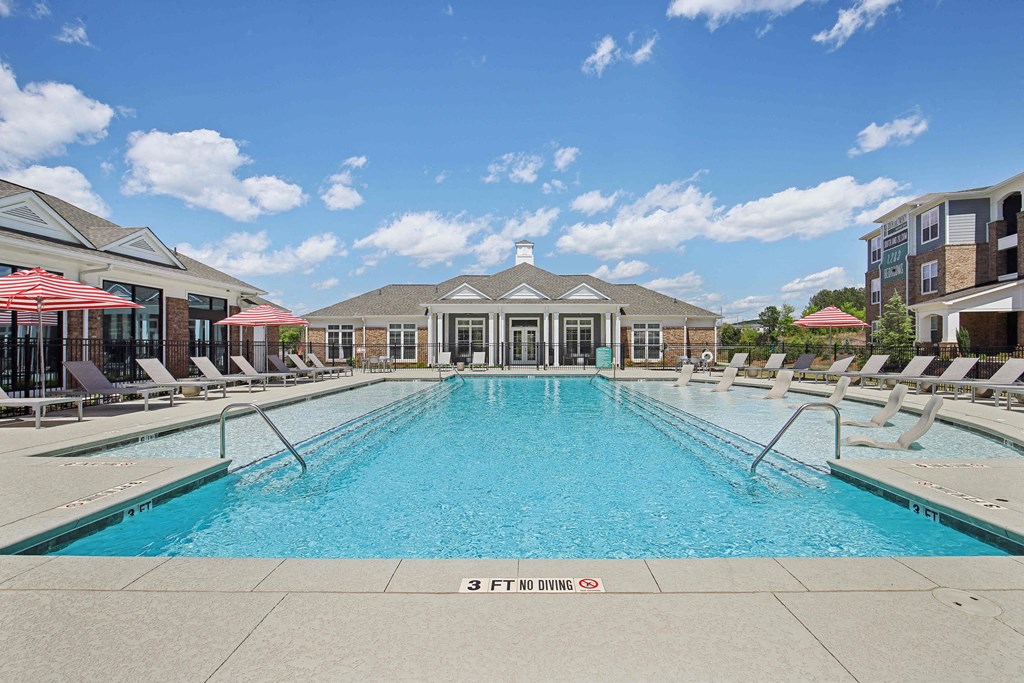 the swimming pool at the estates apartments