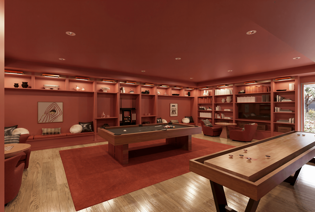 a billiards room with a pool table and a television