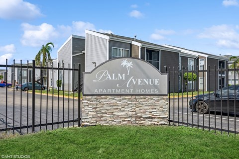 Palm Avenue Apartment Homes is a residential complex with a gated entrance.