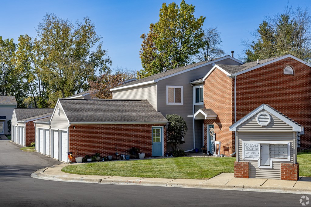 A row of houses with a sign that says "BASICS" on it.
