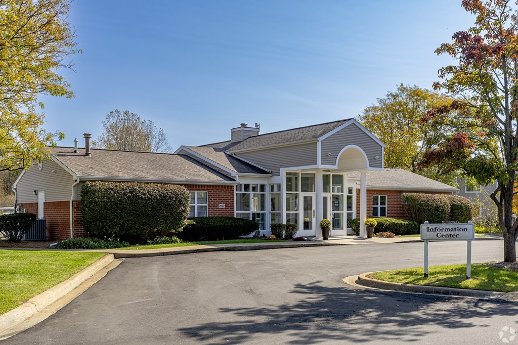 A building with a sign that says "Information Center" in front of it.