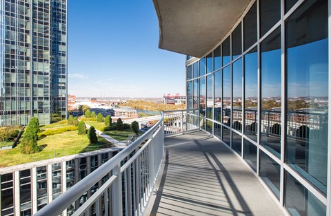 Rooftop terrace with skyline views at Placemakr Premier SoBro Apartments, Nashville, TN