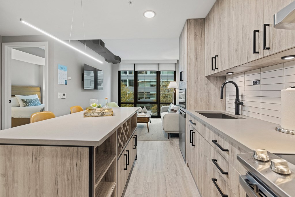 Apartment with modern, full kitchen.