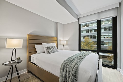 Spacious bedroom with floor-to-ceiling windows at Coda on Half Apartments, Washington, DC 20003