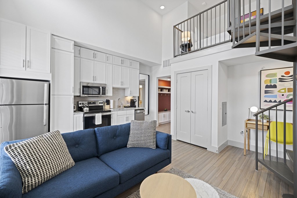 Kitchen with white cabinets at Placemakr Downtown Austin, Austin, TX