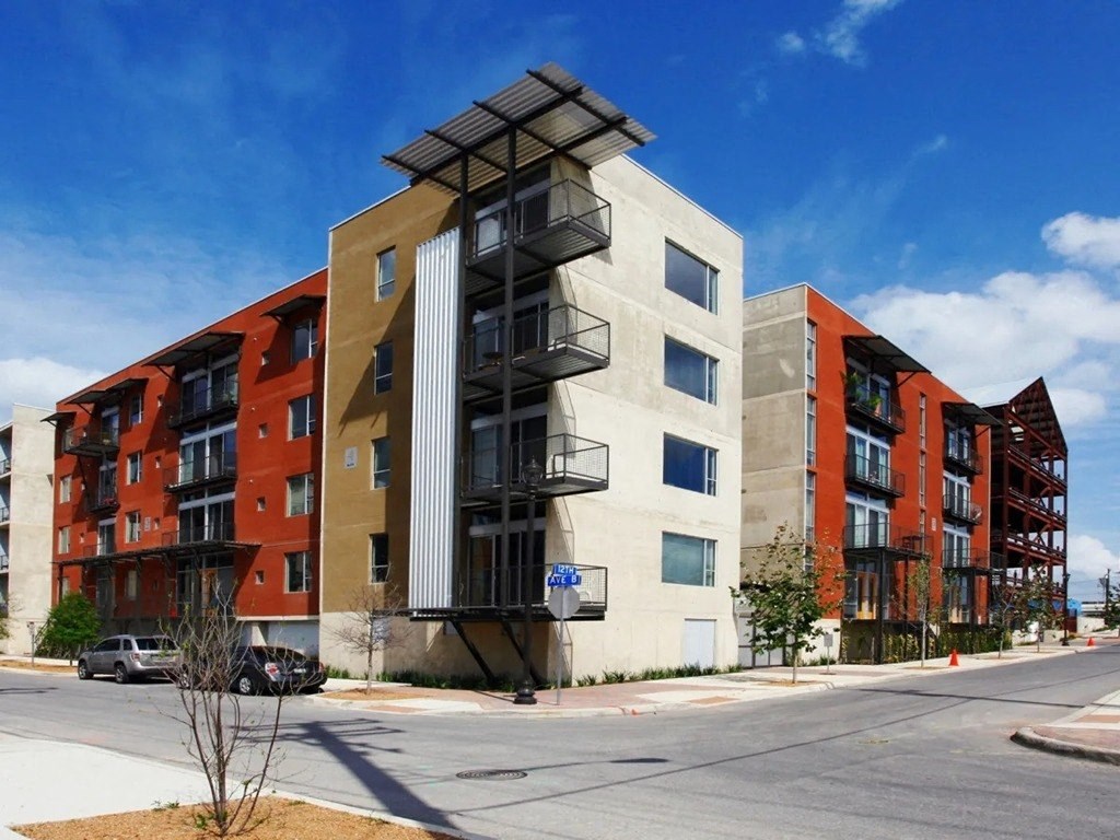 Building with lots of parking area at 1221 Broadway Lofts, Texas, 78215
