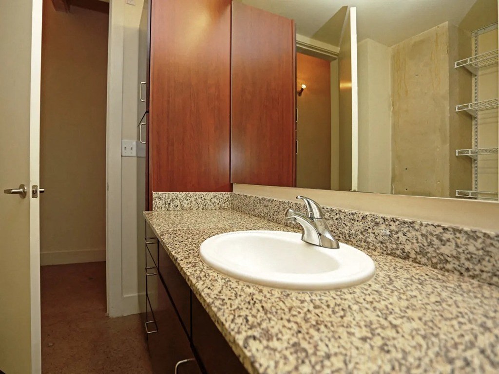 Renovated Bathrooms With Quartz Counters at 1221 Broadway Lofts, San Antonio, TX, Texas, 78215