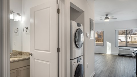 A laundry room with a washer and dryer.