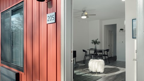 A red building with the number 205 on it.