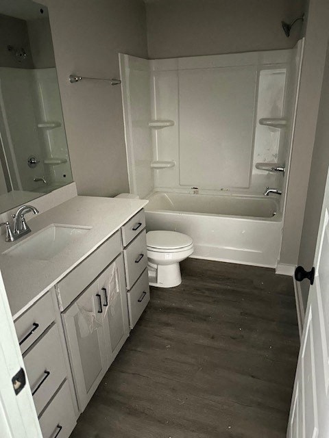 a bathroom with a toilet sink and bathtub